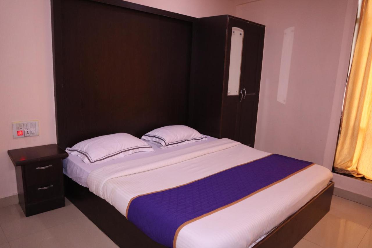 Smilestay Bns Lodge Bangalore Eksteriør billede